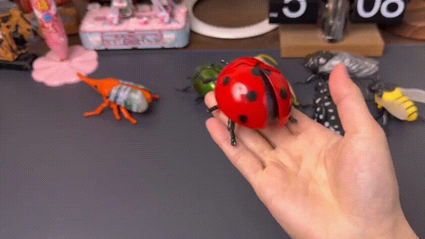 Wind-up insect toy crawling
