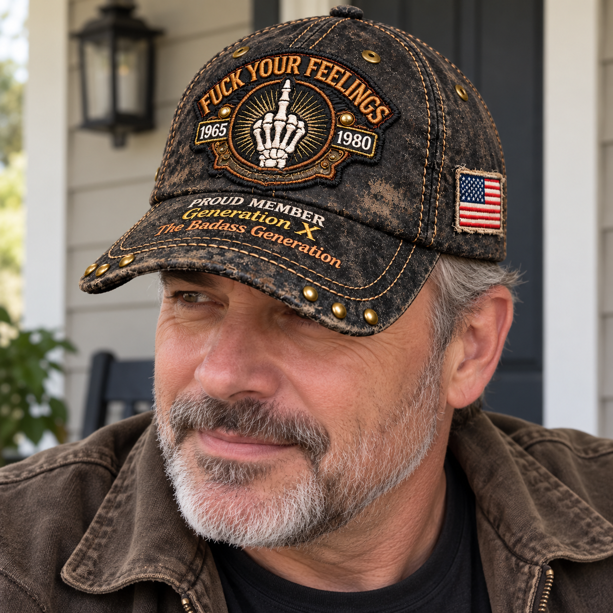 An adult man wearing the weathered Generation X cap with the front badge and brim wording visible