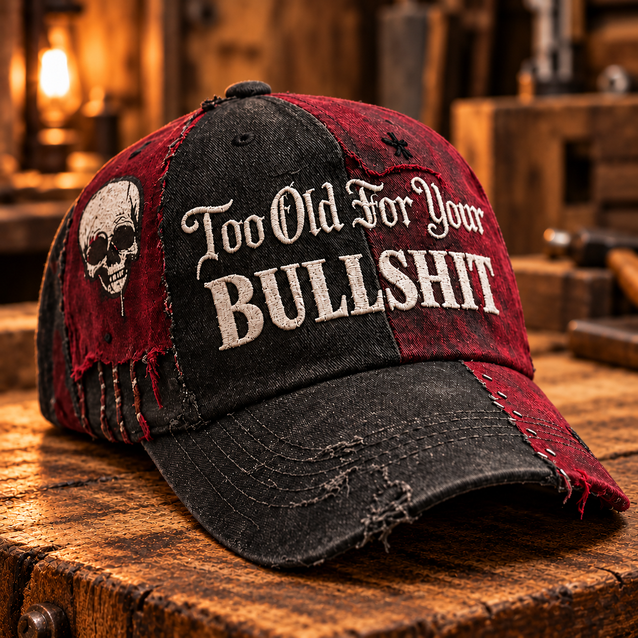Black and burgundy patchwork cap with Too Old For Your BULLSHIT lettering, side skull and distressed curved brim