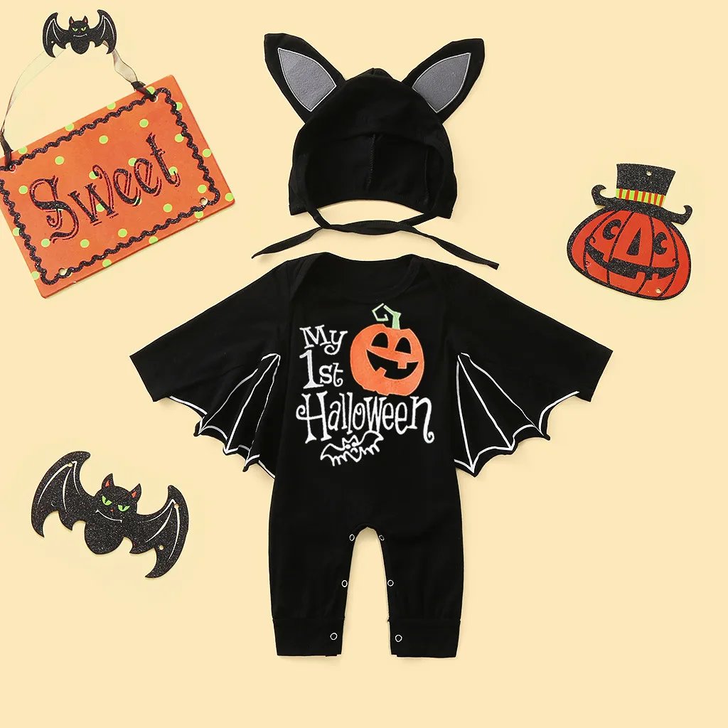 Flat lay of baby black bat Halloween romper