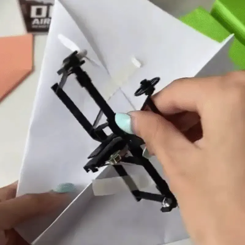 Attaching RC power kit to a folded paper airplane