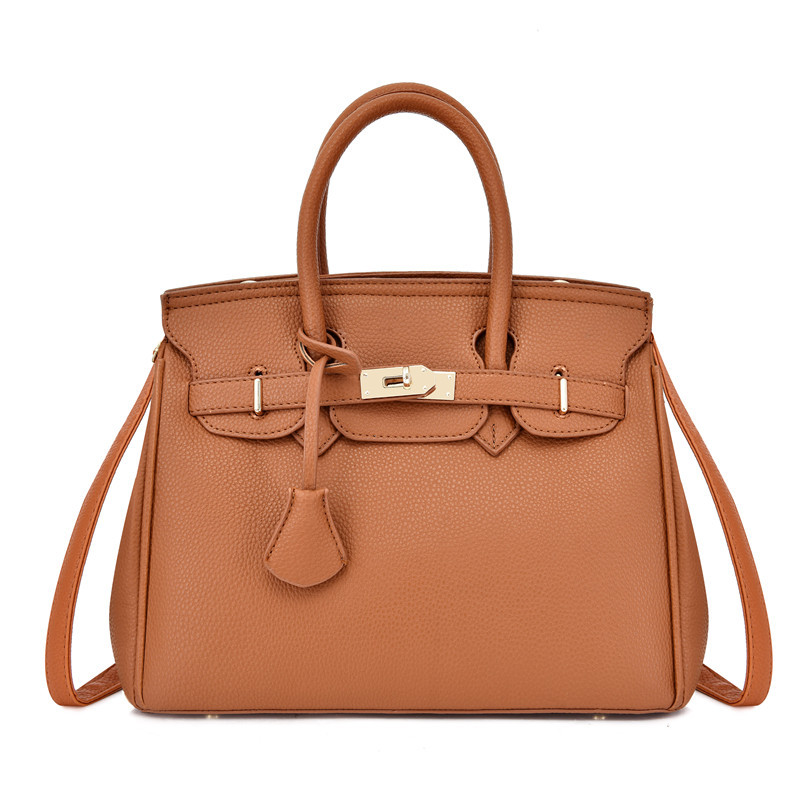 VN-B18Refined Elegance · Solid Leather Tassel Bag