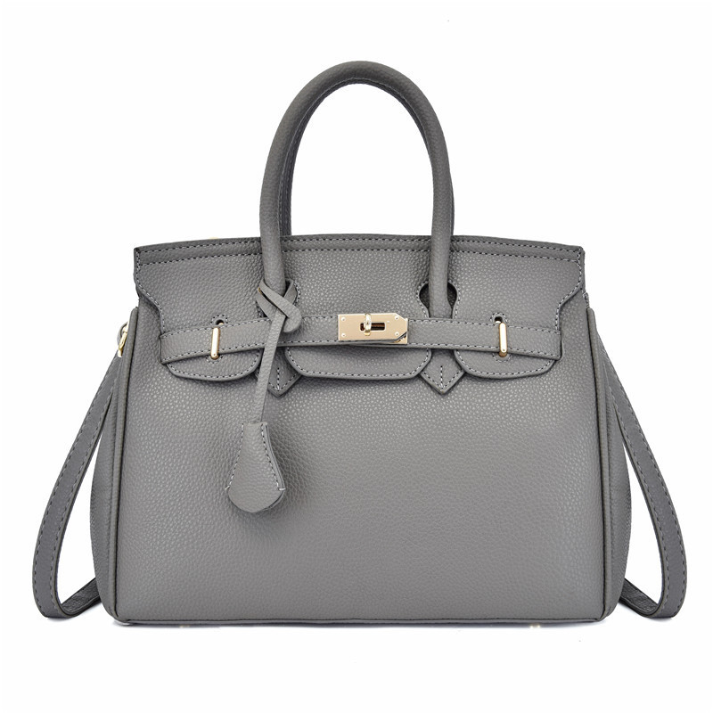 VN-B18Refined Elegance · Solid Leather Tassel Bag