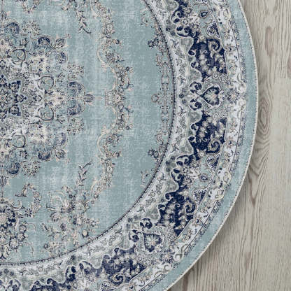 Light blue oriental floral round rug for a faded, vintage bohemian vibe