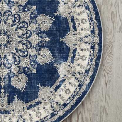 Navy blue and white round rug for a distressed, vintage bohemian vibe