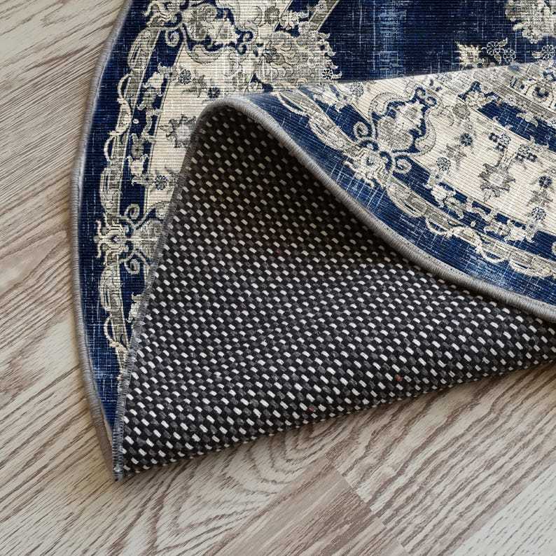 Navy blue and white round rug for a distressed, vintage bohemian vibe