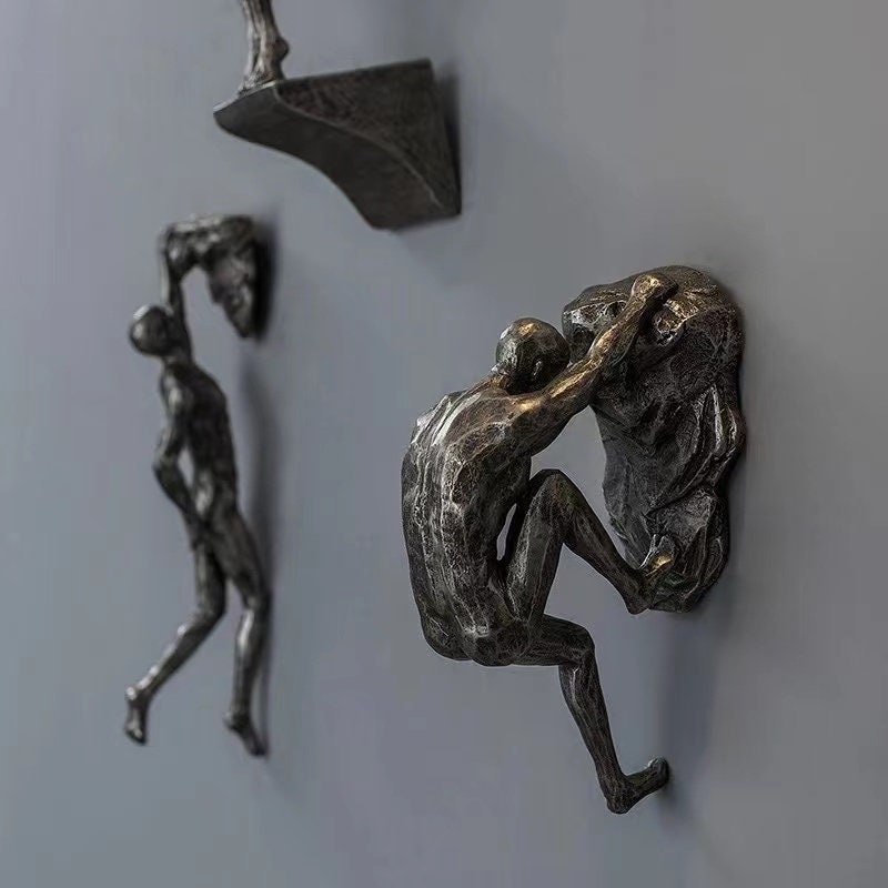 Large Copper Black Resin Climbing Man Wall Sculpture