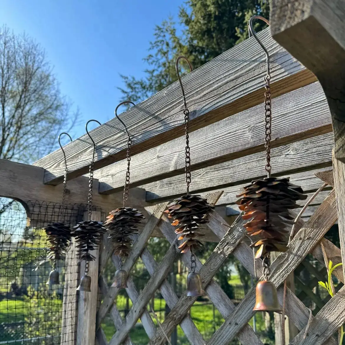 Handmade Metal Pinecone Chime with Bell – Artisan-Crafted Rustic Hanging Decor (11")