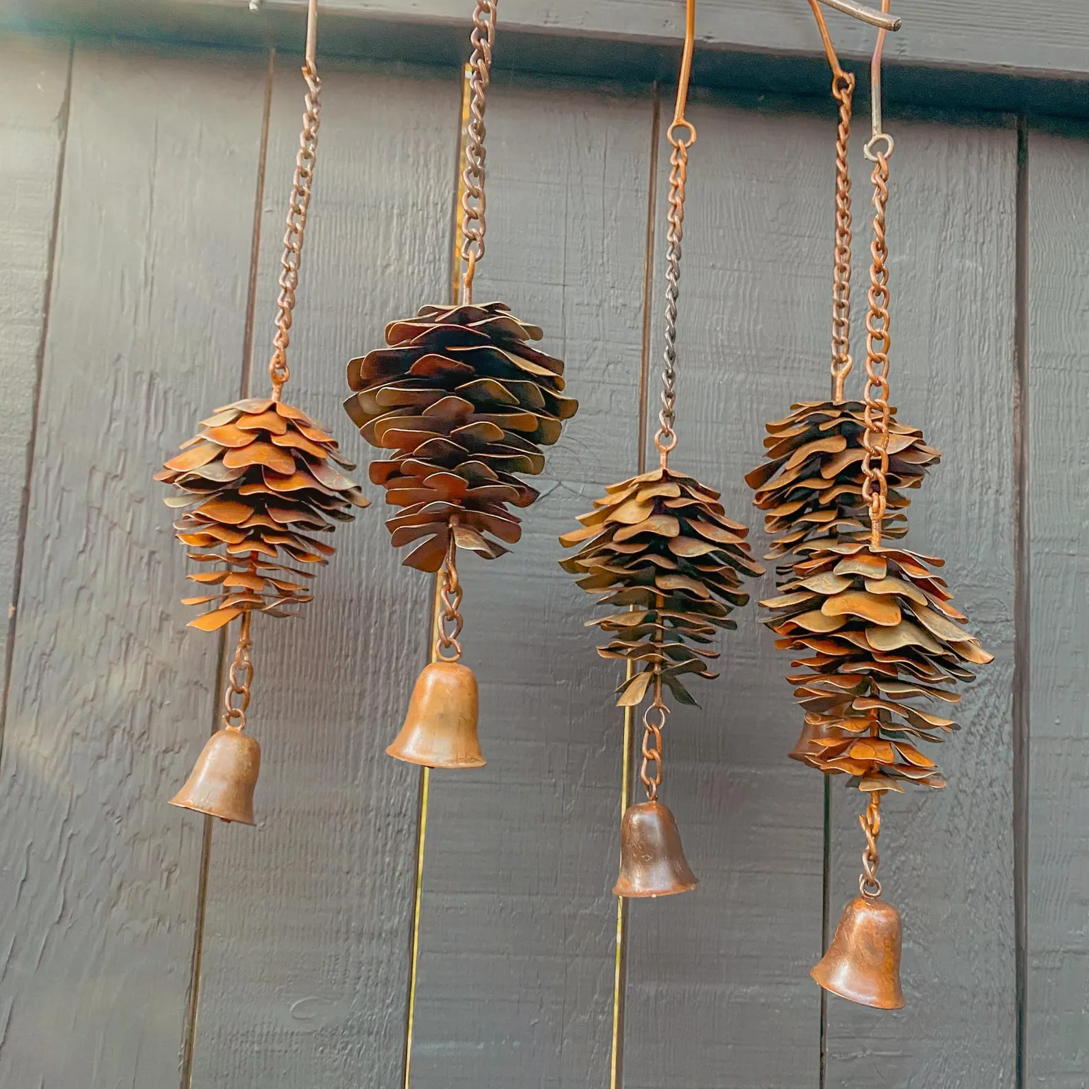 Handmade Metal Pinecone Chime with Bell – Artisan-Crafted Rustic Hanging Decor (11")