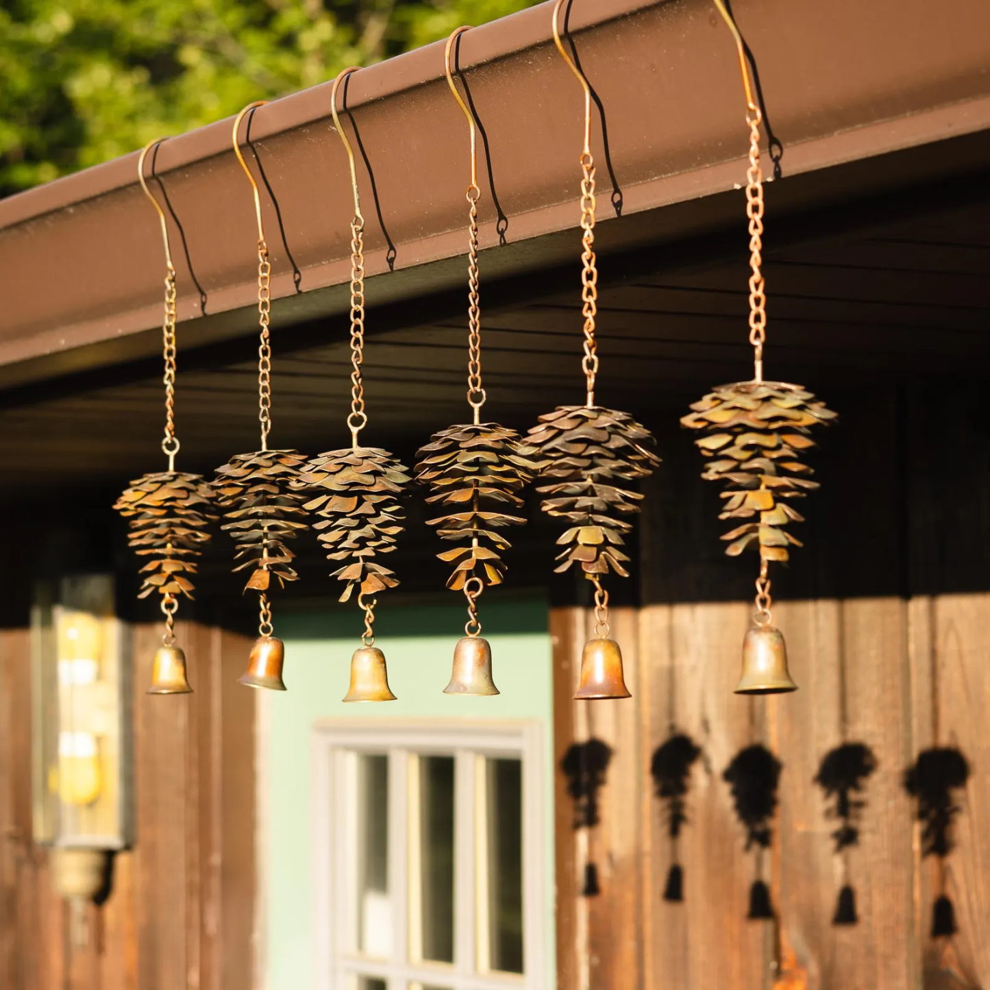 Handmade Metal Pinecone Chime with Bell – Artisan-Crafted Rustic Hanging Decor (11")
