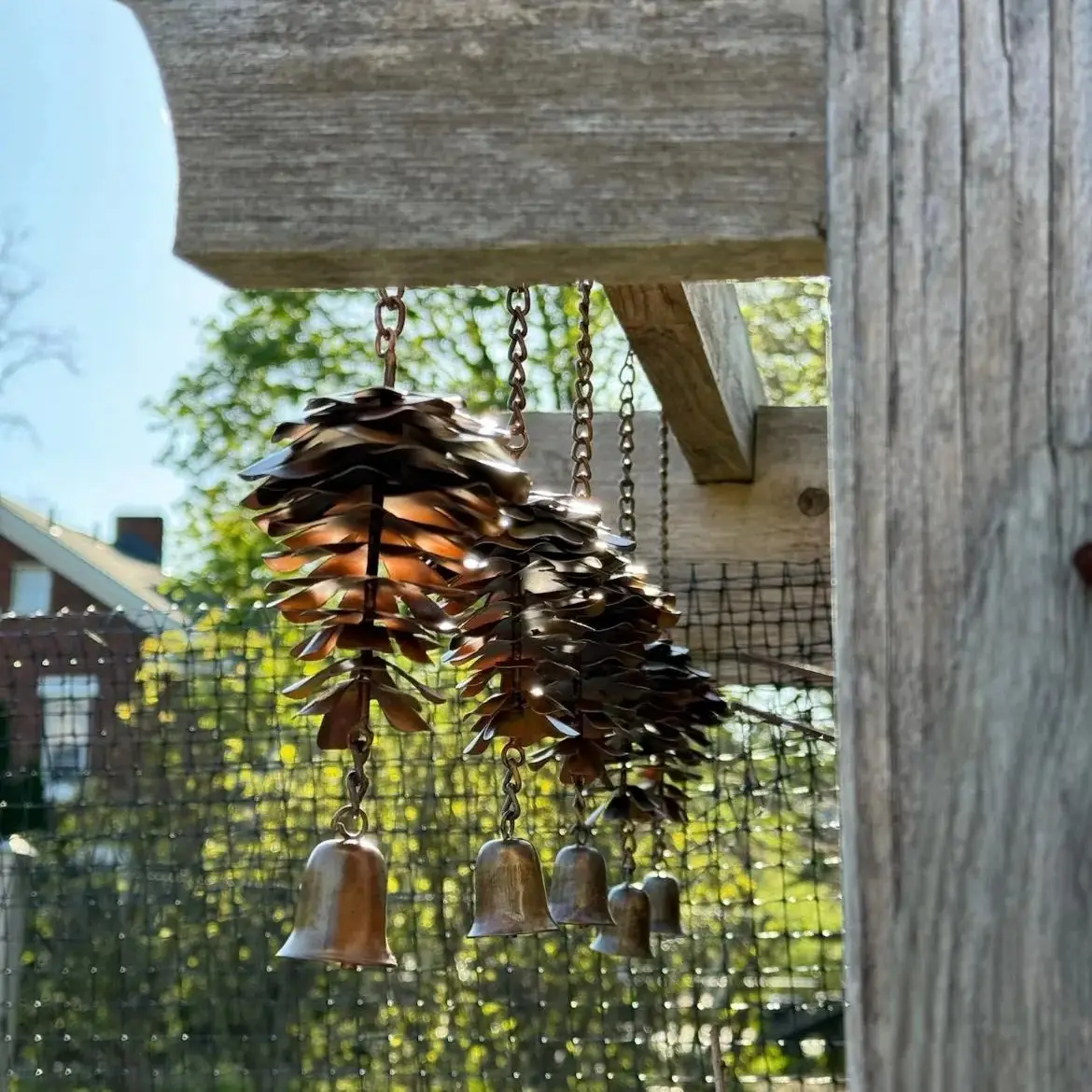 Handmade Metal Pinecone Chime with Bell – Artisan-Crafted Rustic Hanging Decor (11")
