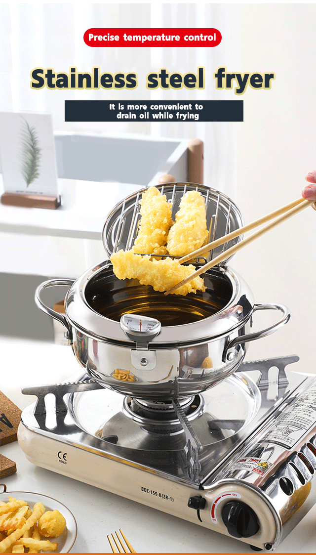 Stainless steel frying pan with glass lid on kitchen counter