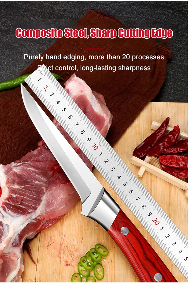 Professional chef using boning knife for filleting fish