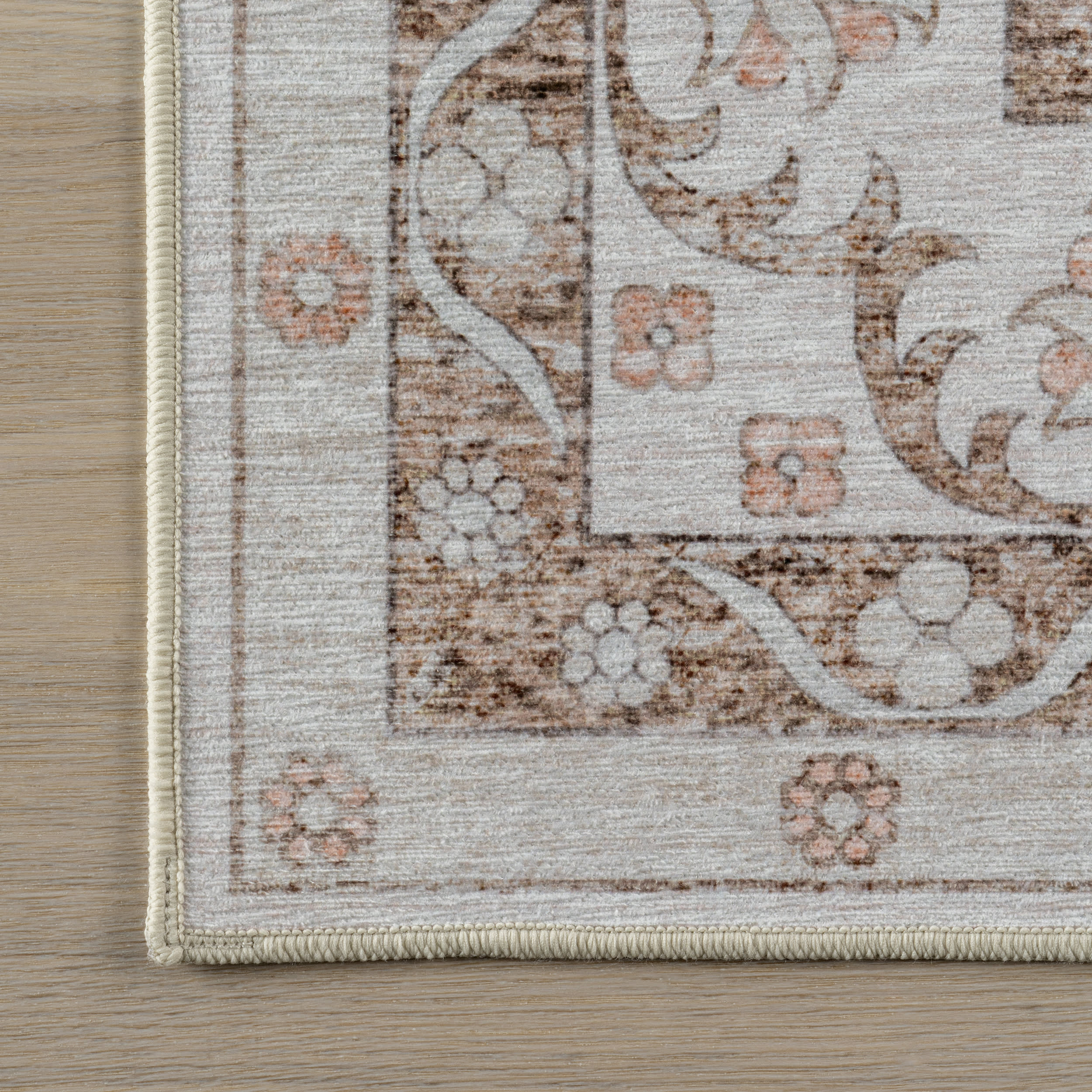 Faded Rosette Spill Proof Washable Rug | Peach