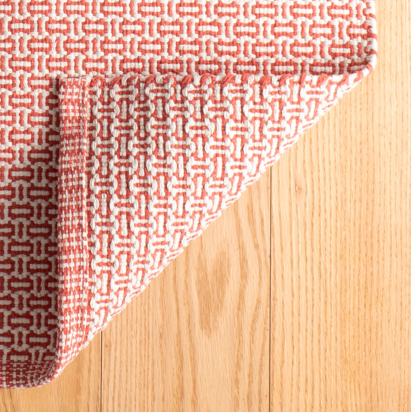 Miss Muffet Handwoven Cotton Rug | Paprika