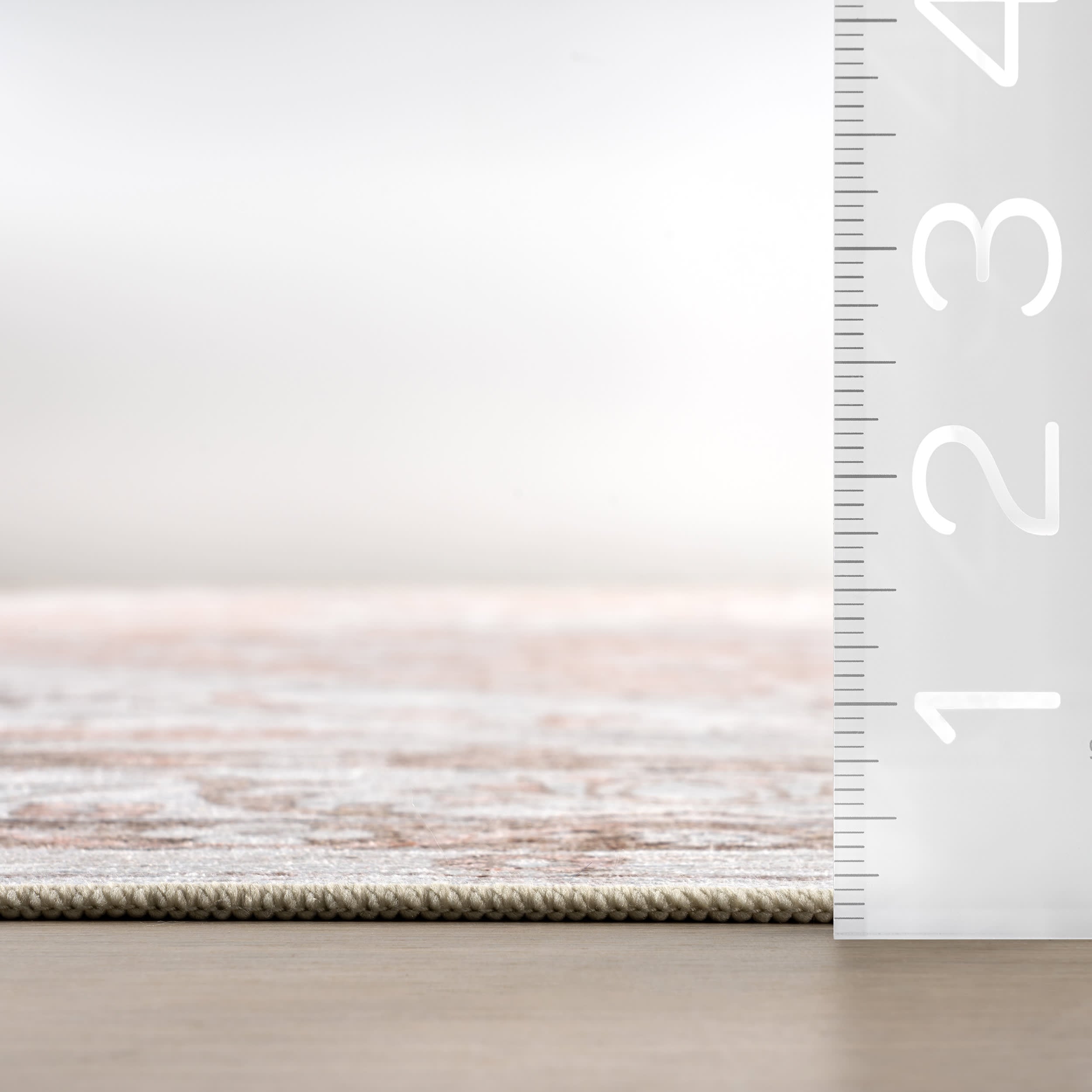 Faded Rosette Spill Proof Washable Rug | Peach