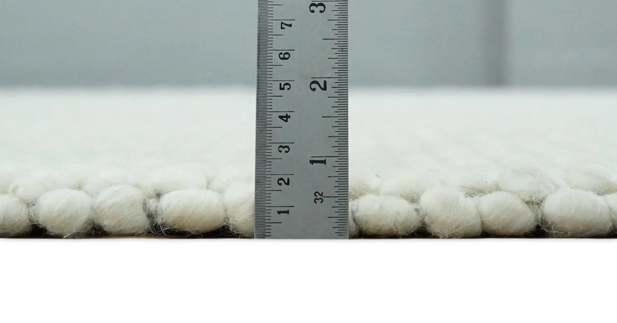 Solid Ivory Wool Felted Chunky Hand Woven Contemporary Area Rug - The Mayfair Hall