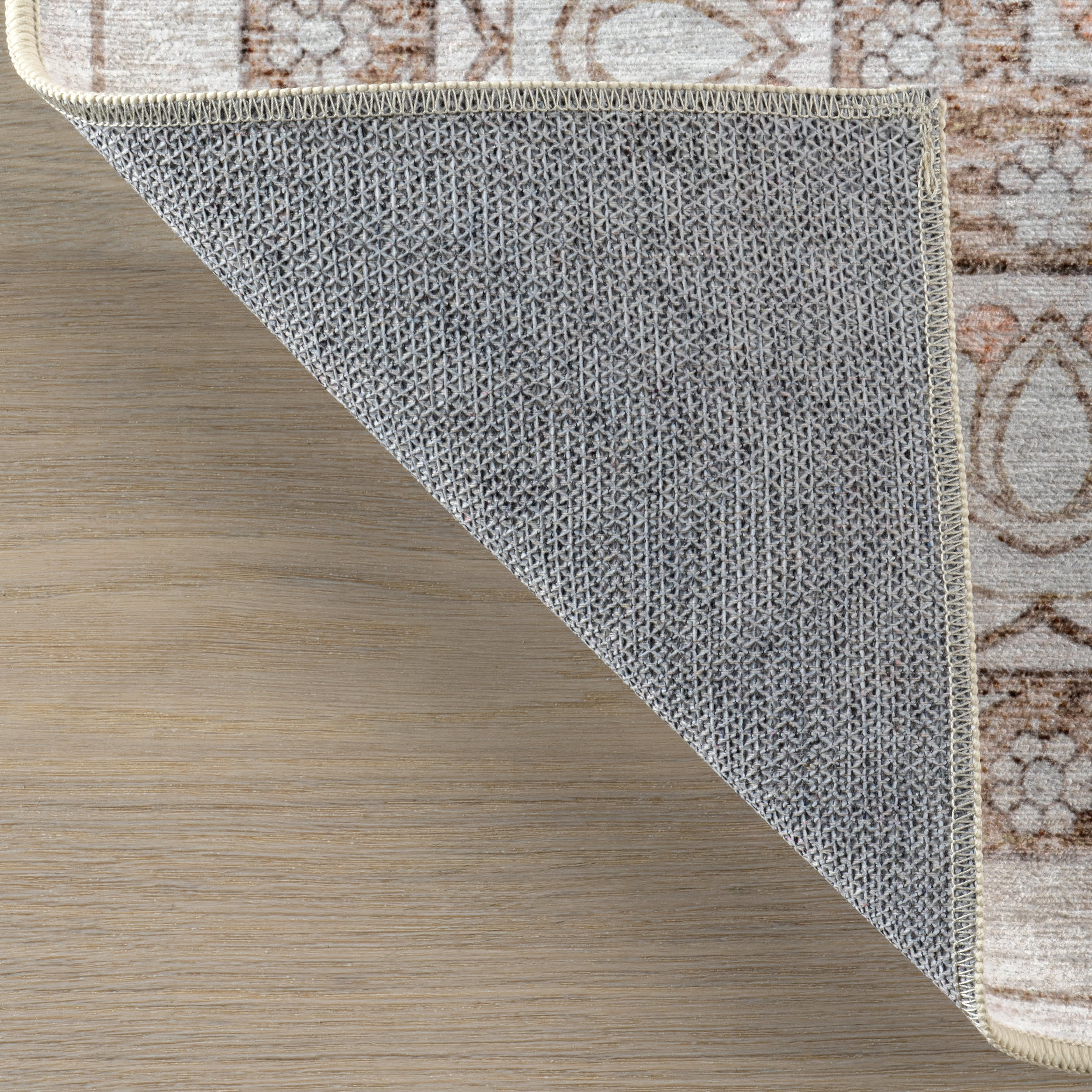 Faded Rosette Spill Proof Washable Rug | Peach