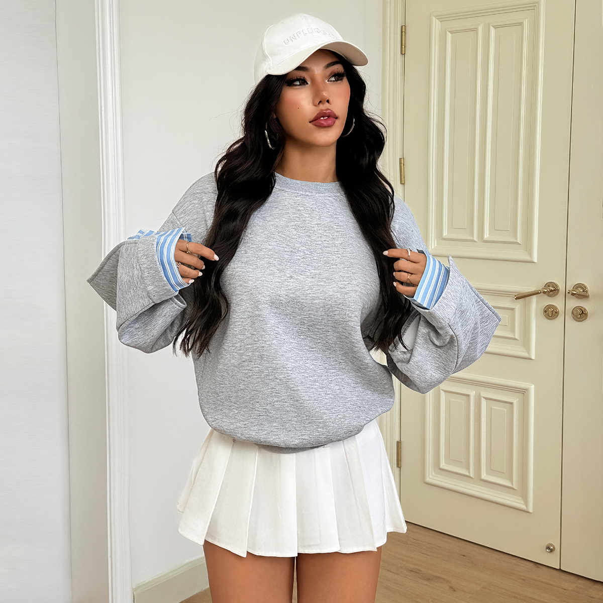 Women's casual sweatshirt with striped cuffs