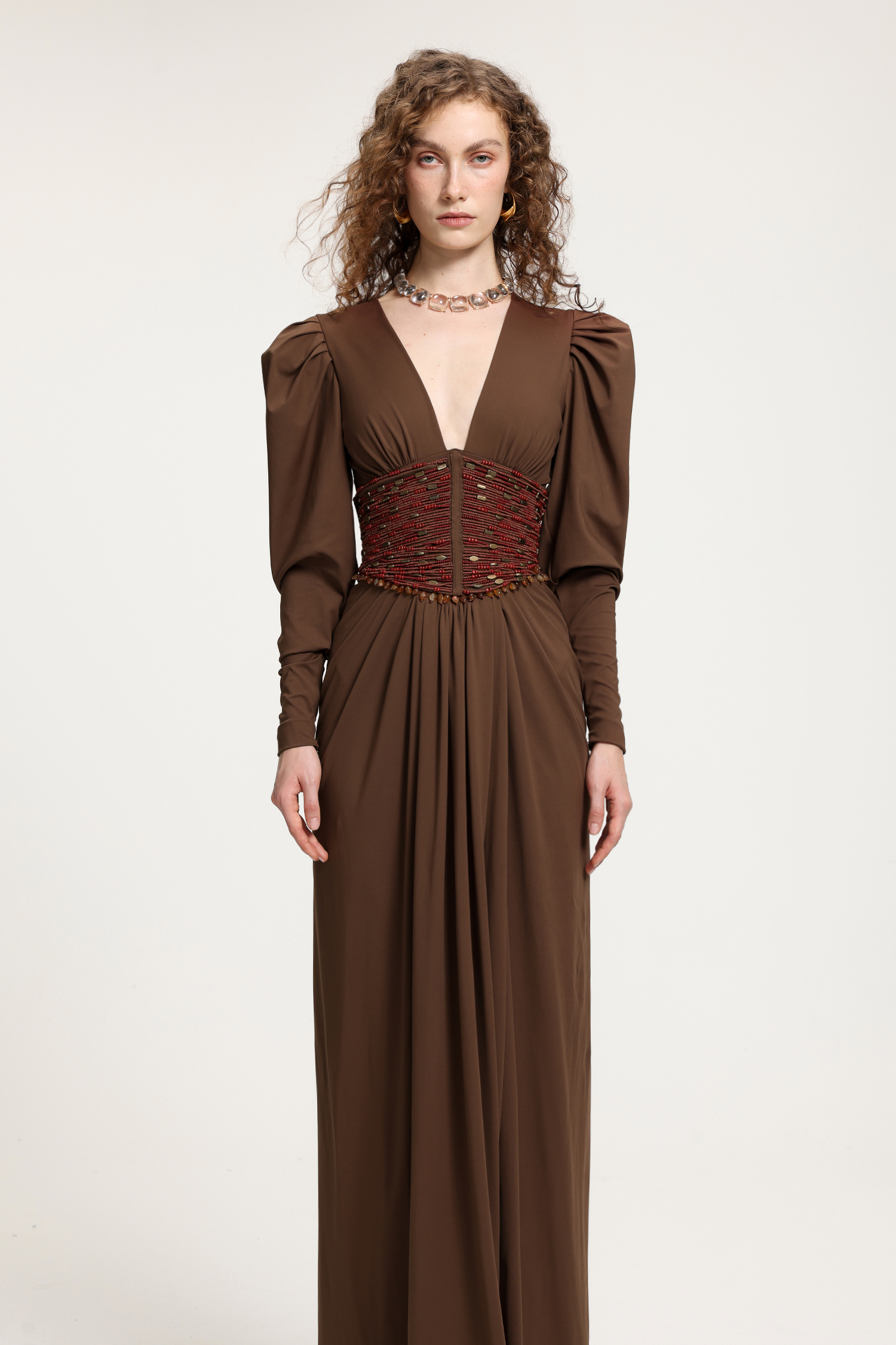 Brown Deep V-Neck Puffed Sleeve Gown With Red Beaded Corset Waist & Floor-Length Skirt
