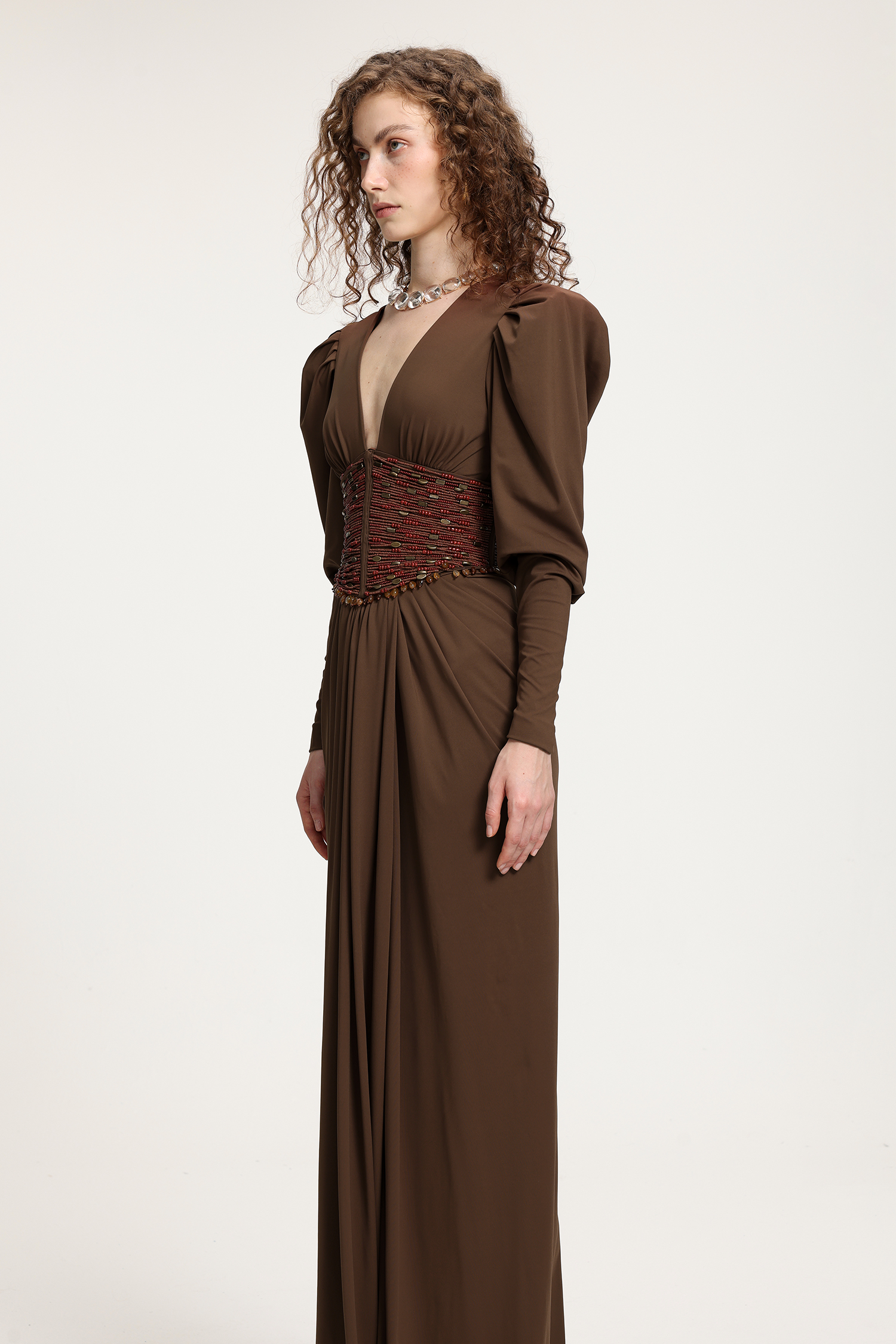 Brown Deep V-Neck Puffed Sleeve Gown With Red Beaded Corset Waist & Floor-Length Skirt