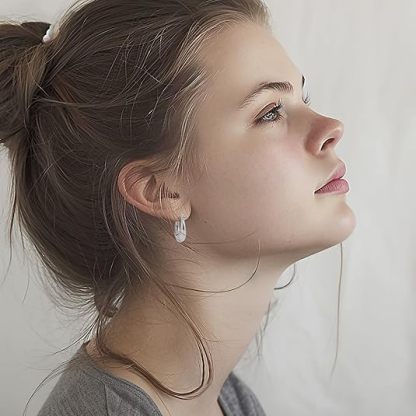 2 pairs of women's 14K gold-plated and silver hoop earrings