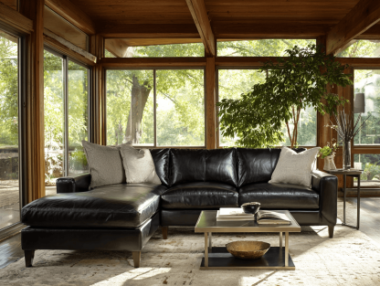 Hoekbank in leer 285×185×85 cm – zwart – modern design – met chaise longue en kussens