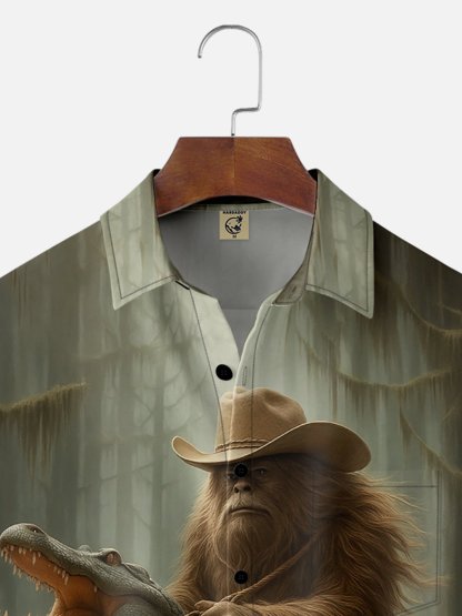 Moisture-wicking Funny Bigfoot Cowboy vs. Alligator Chest Pocket Hawaiian Shirt