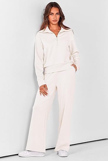 2025 New Women's Two-Piece Casual Set: Collared Half-Zip Sweatshirt paired with wide-leg pants, perfect for casual travel and vacation wear.