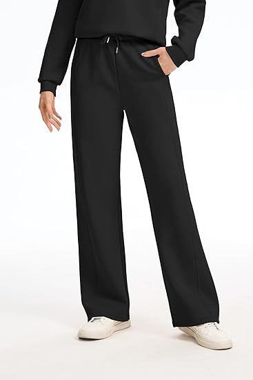 2025 New Women's Two-Piece Casual Set: Collared Half-Zip Sweatshirt paired with wide-leg pants, perfect for casual travel and vacation wear.
