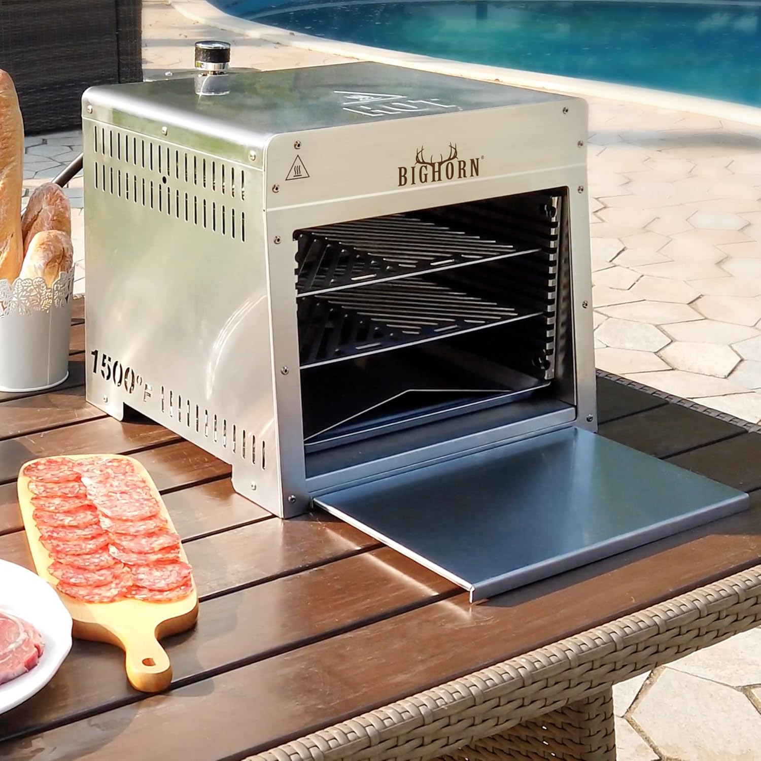 Stainless steel Big Horn 1500℉ portable infrared steak grill with open door and food, ready for grilling