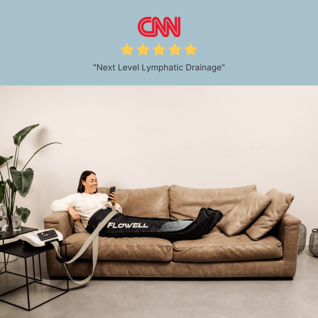 Flowell Home Deluxe Pants Set - Woman laying on couch wearing Flowell Home Deluxe Pants Set in black and light blue. "Next level Lymphatic Drainage" - CNN