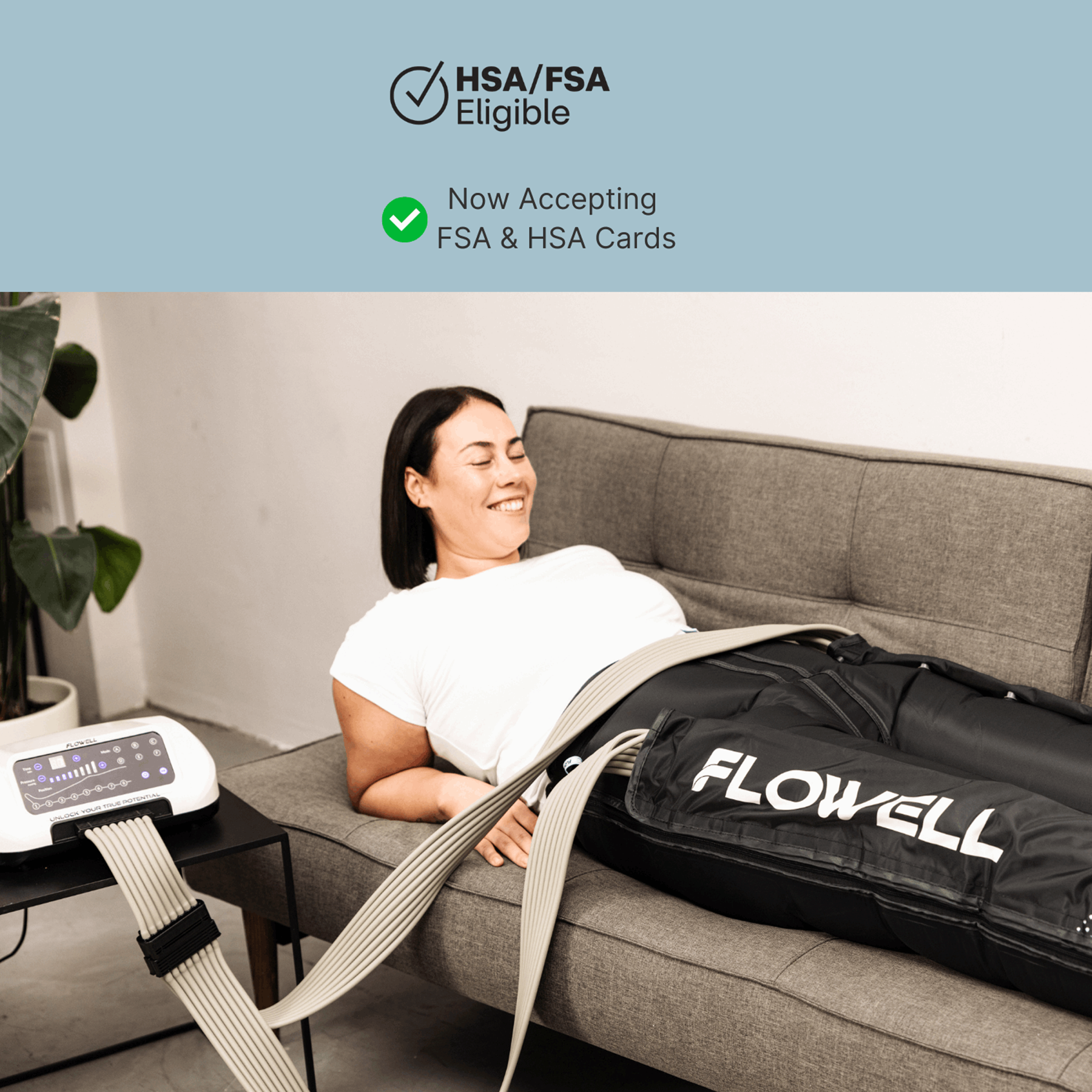 Flowell Home Deluxe Pants Set - Woman laying on couch wearing Flowell Home Deluxe Pants Set with it's control unit by her side. Now Accepting HSA and FSA Payments
