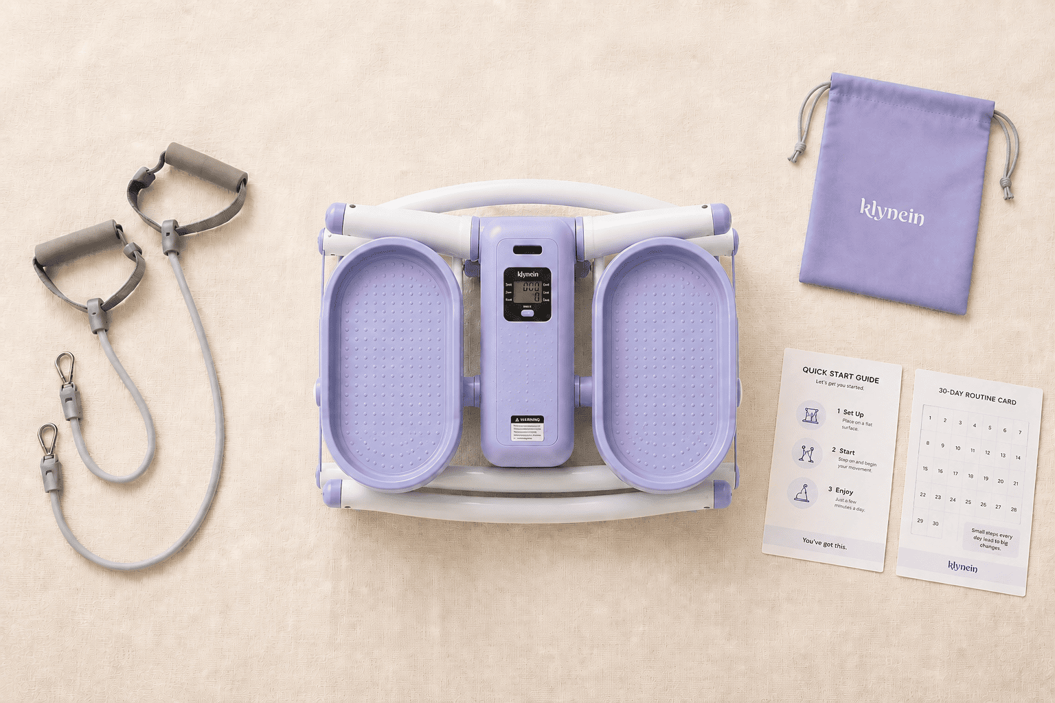 What's in the box - Rock Stepper, resistance bands, quick-start guide, and 30-day routine card flat-lay