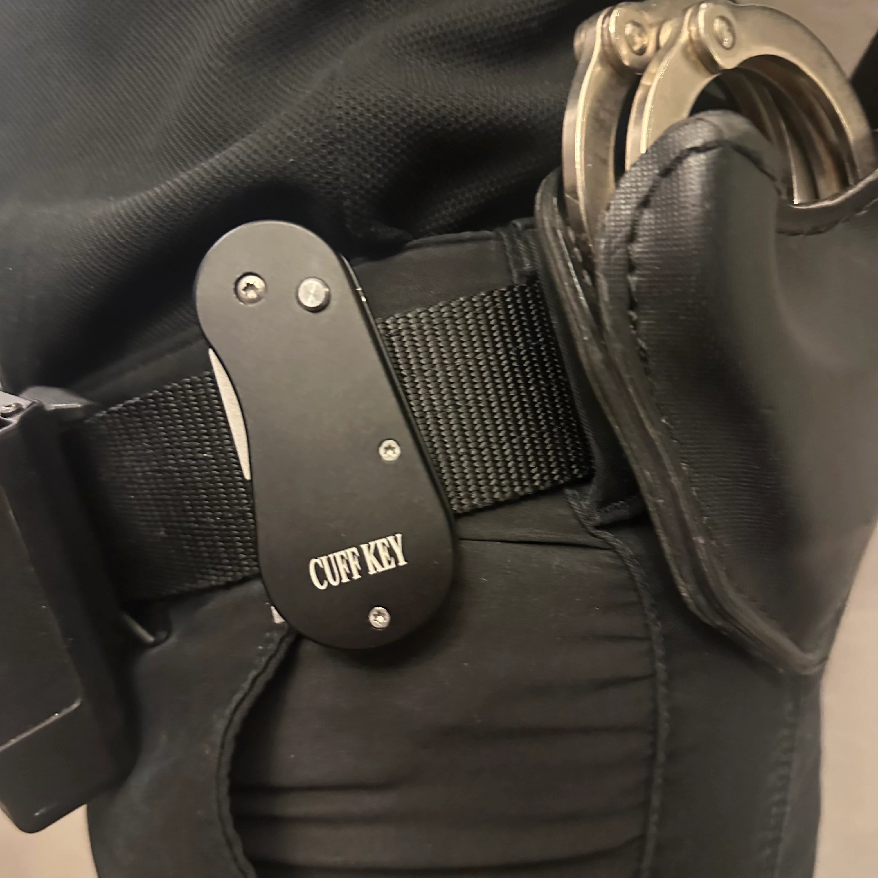 Tactical Retractable Handcuff Key