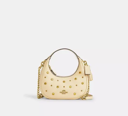 Mini Crossbody Bag In Signature Canvas