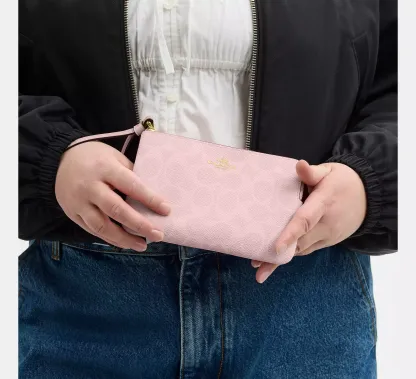 Corner Zip Wristlet In Signature Canvas