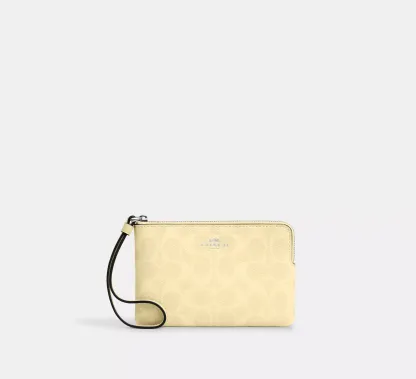 Corner Zip Wristlet In Signature Canvas