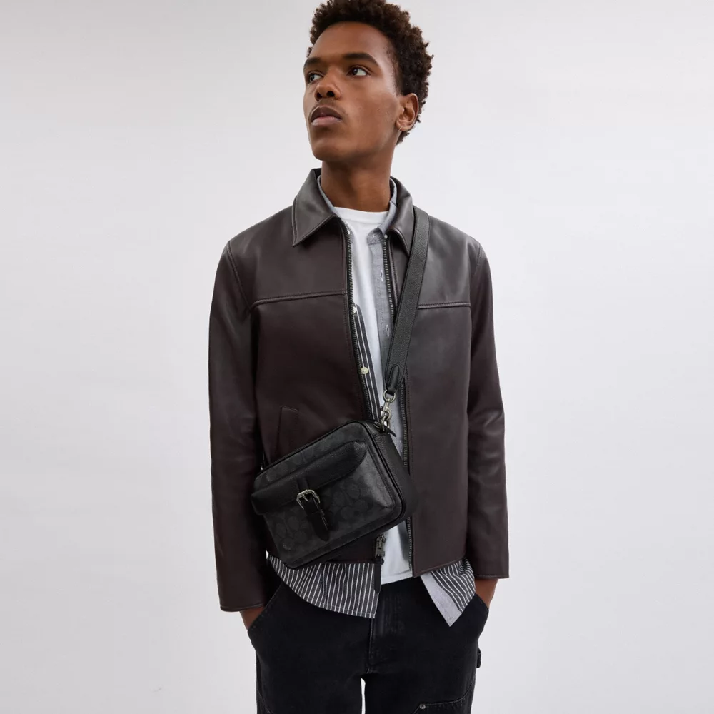 Warner Crossbody Bag In Signature Canvas