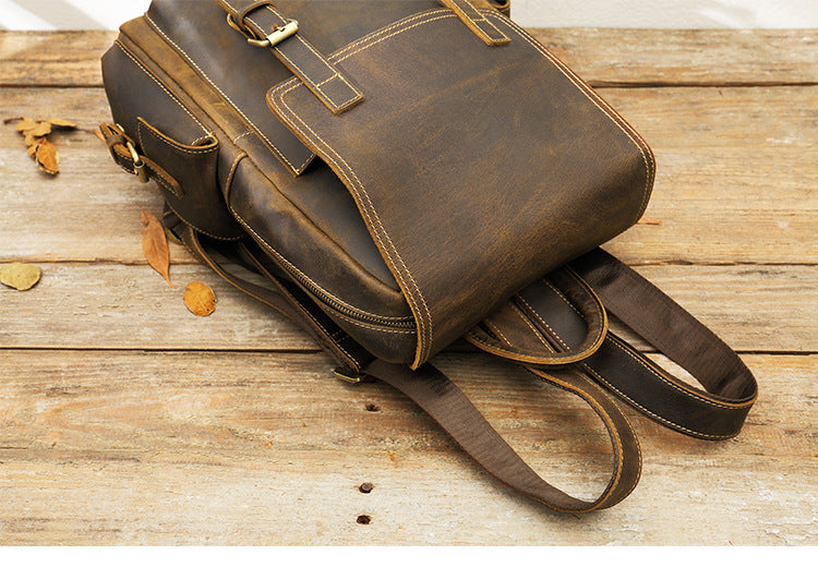 small cow leather hiking backpack womens with zipped pockets to securely transport a wallet, a coin purse, a card holder or sunglasses