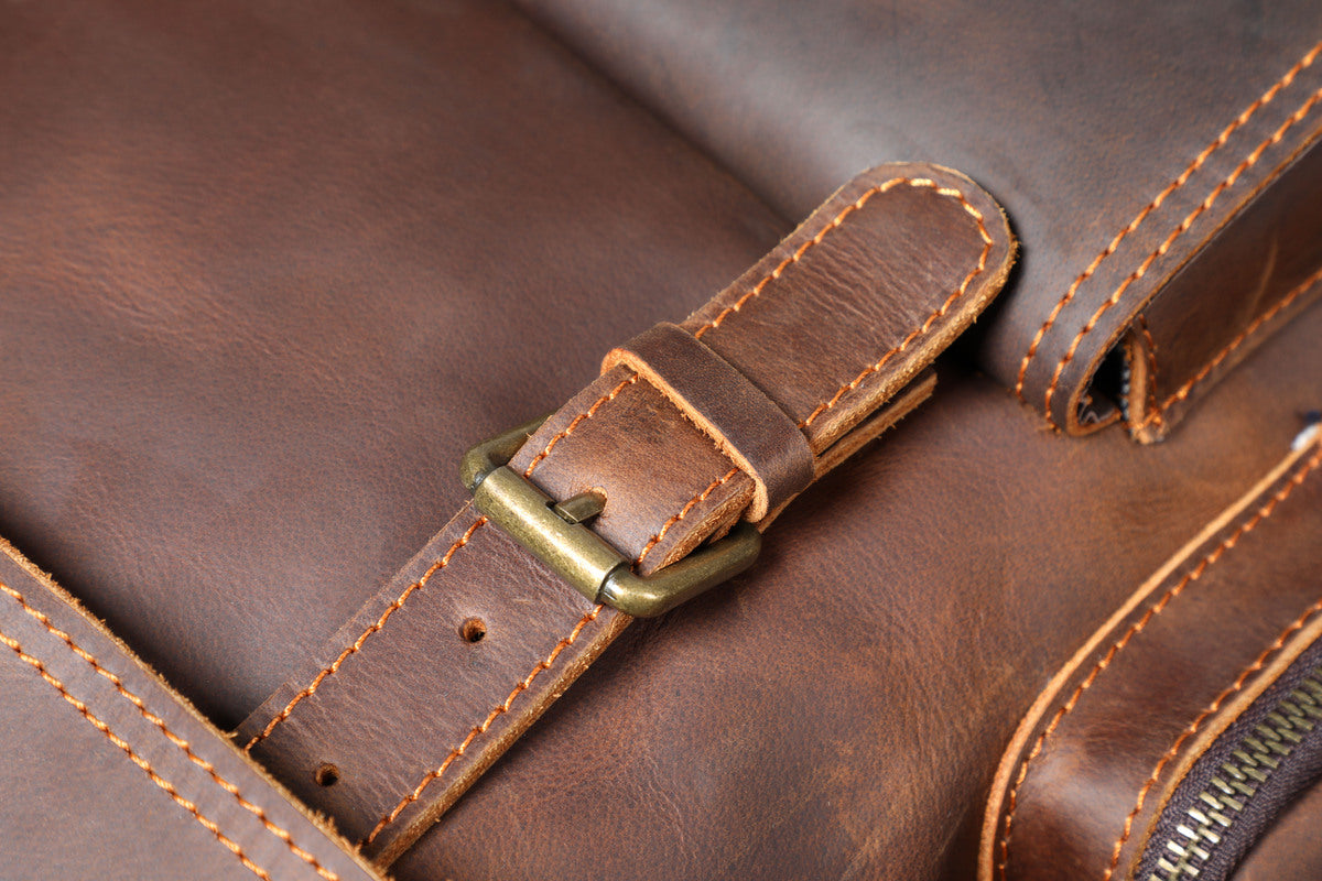 sac à dos en cuir marron pour ordinateur portable