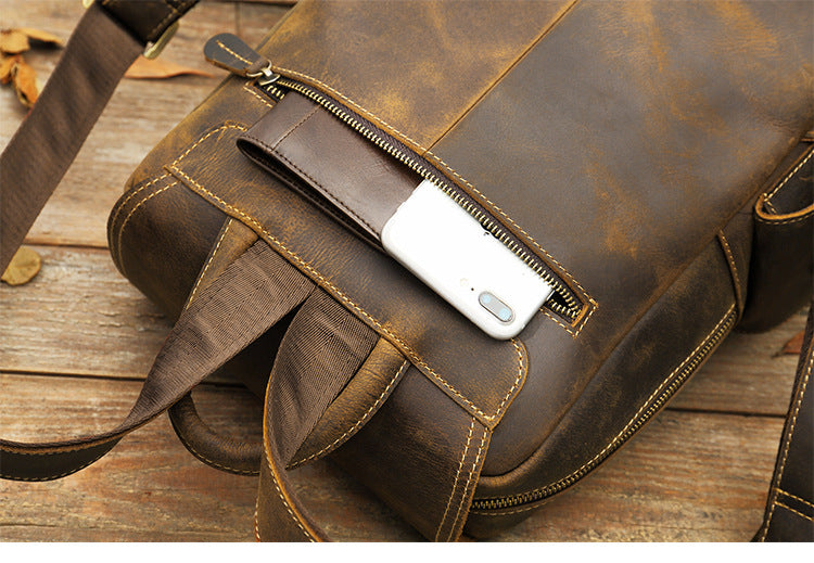 everyday use large leather rucksack womens with roomy organizer to store a toiletry pouch, garment, jackets or other belongings