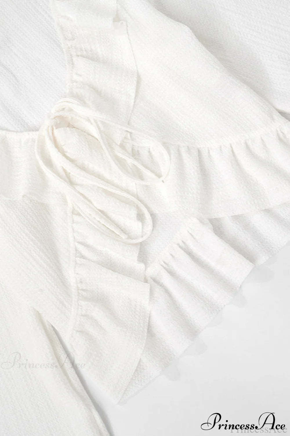 Solid Color Ruffled Tie Long Sleeve Blouse