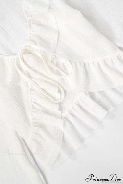 Solid Color Ruffled Tie Long Sleeve Blouse
