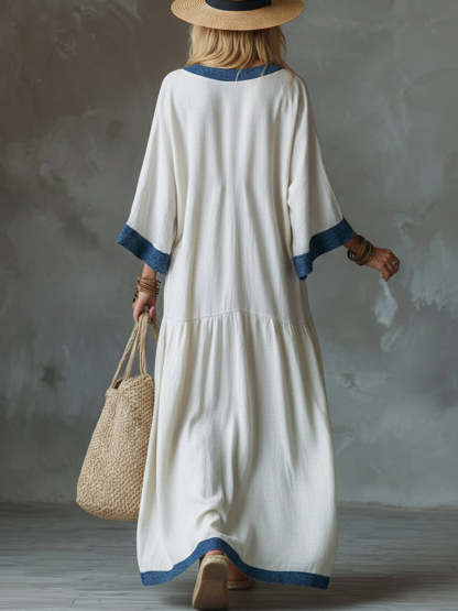 Loose And Cozy Patchwork Denim Dress With Contrasting Trim.