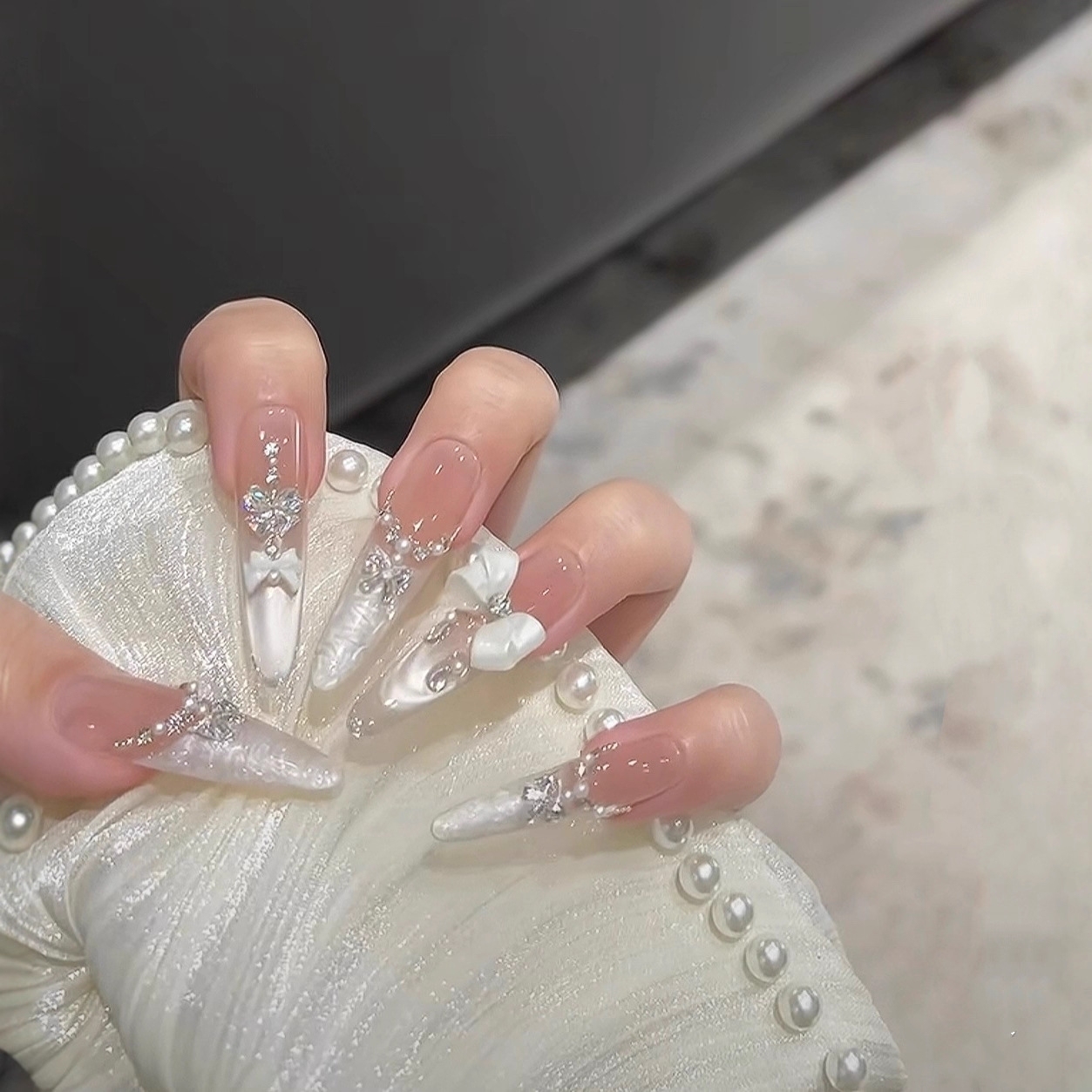 Classic White French Tip Press-On Nails with a Delicate Bow Accent