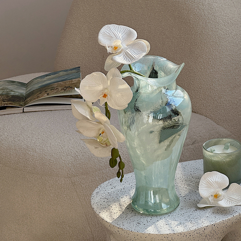 Transparent glass vase with blue patterns