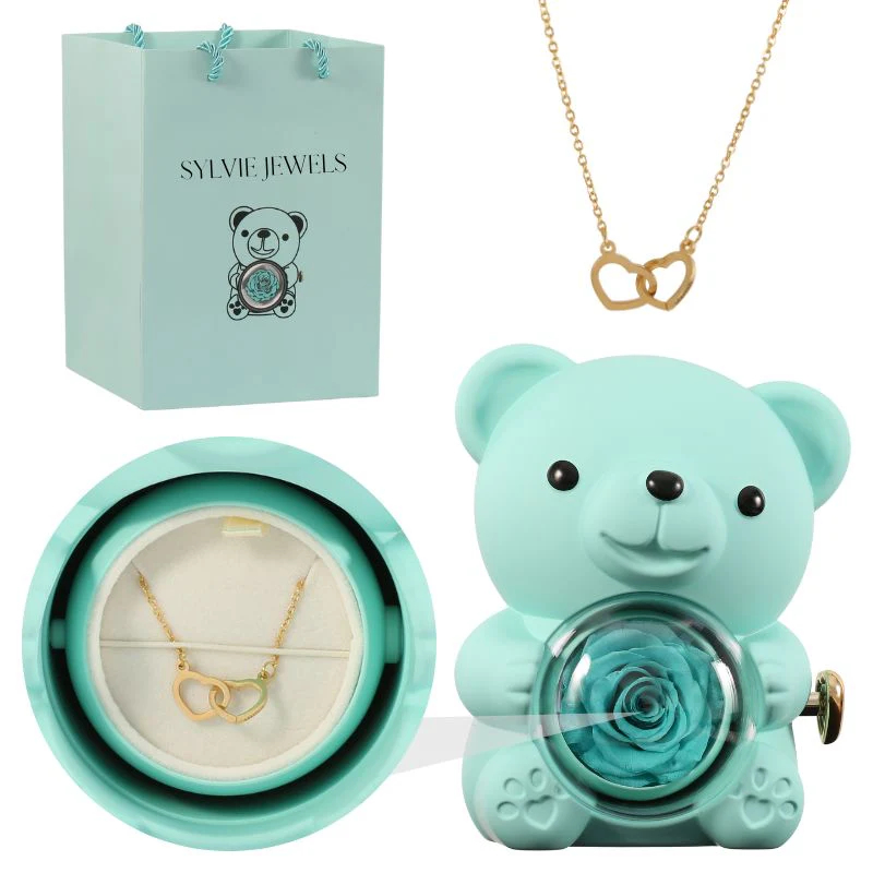 Eternal pink teddy bear with a necklace