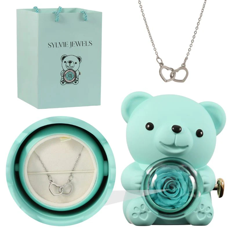 Eternal pink teddy bear with a necklace