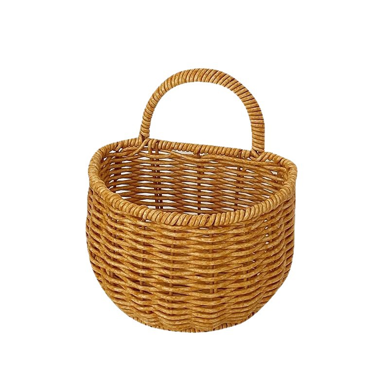 Wall-mounted rattan-like woven basket for storing green onions, ginger, and garlic in the kitchen